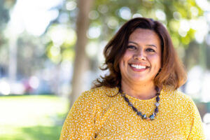 a woman smiling at the camera